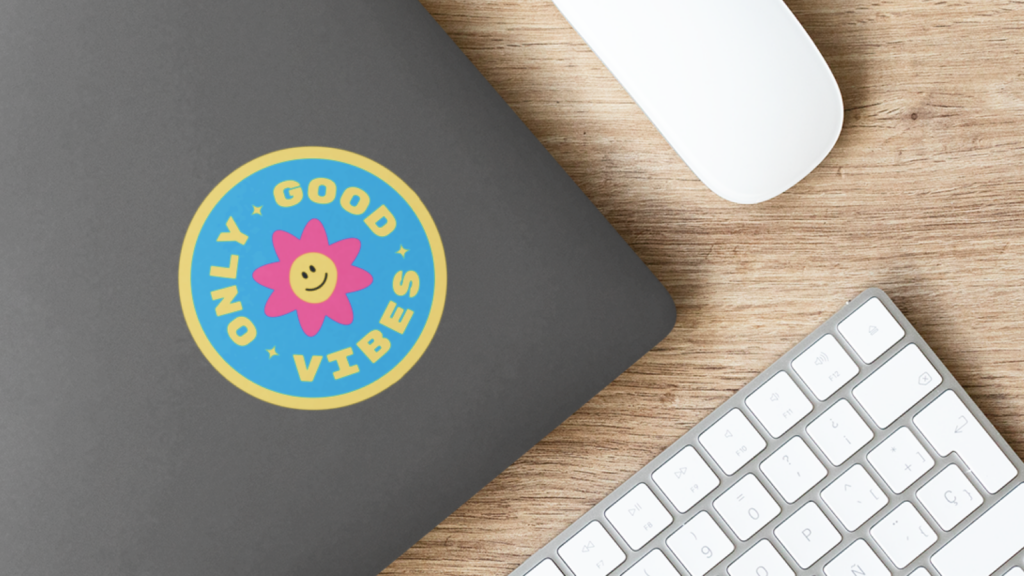 “Only good vibes” sticker on a laptop case.