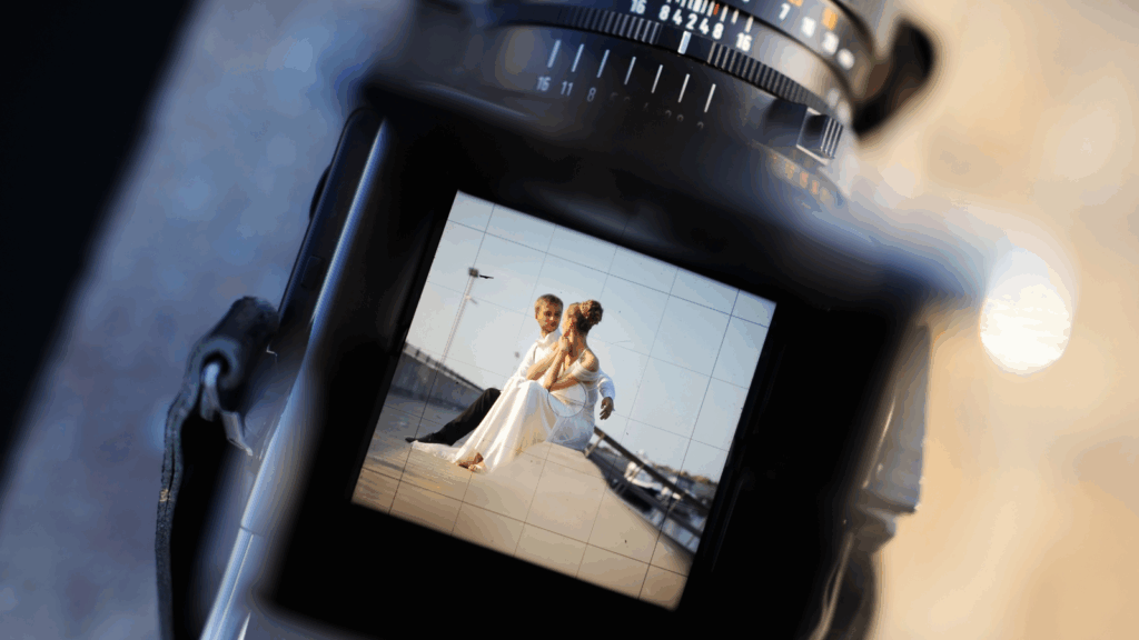 A close-up shot of a camera’s screen with a wedding photograph.