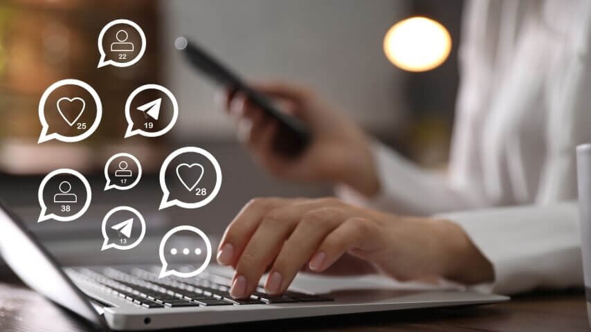 A person using social media to drive traffic to her Shopify store.