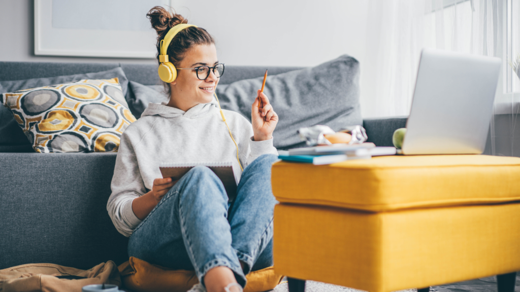 A woman providing online tutoring lessons as a business idea for women.