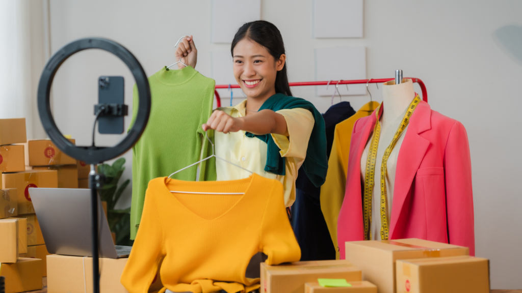 A woman showing products during a livestream.