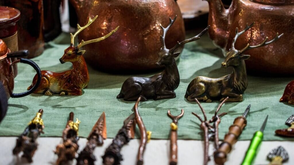 A row of intricately crafted deer figurines.