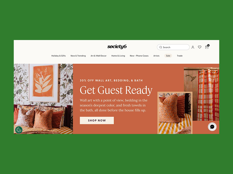 Society6 homepage promoting orange-toned wall art and bedding.