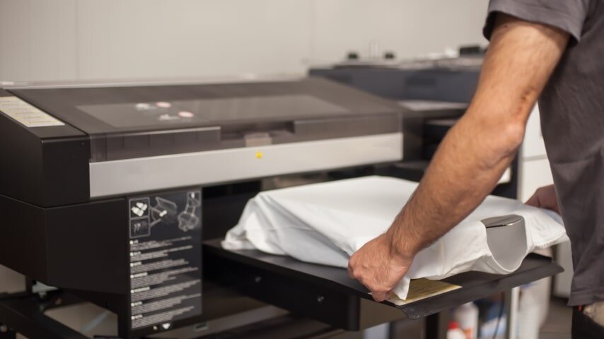 The process of direct-to-garment printing (DTG), as an alternative to screen printing.