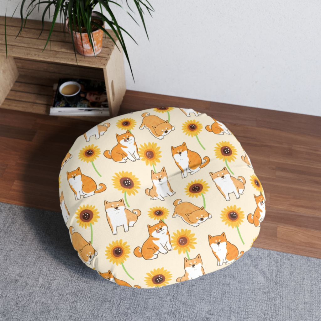 A custom pet bed with an illustrated dog print in orange and yellow.