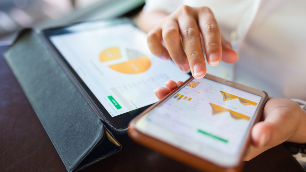A person using a tablet in a business setting, showcasing productivity tools and applications for professional tasks.