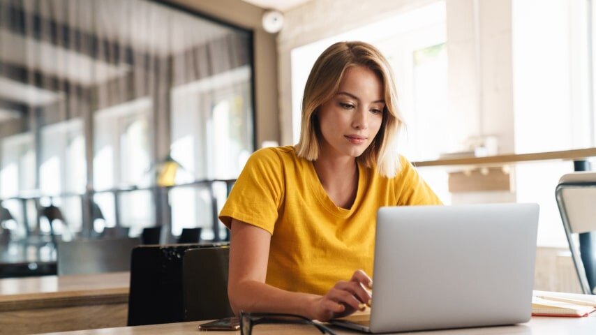 A woman researching her product niche.
