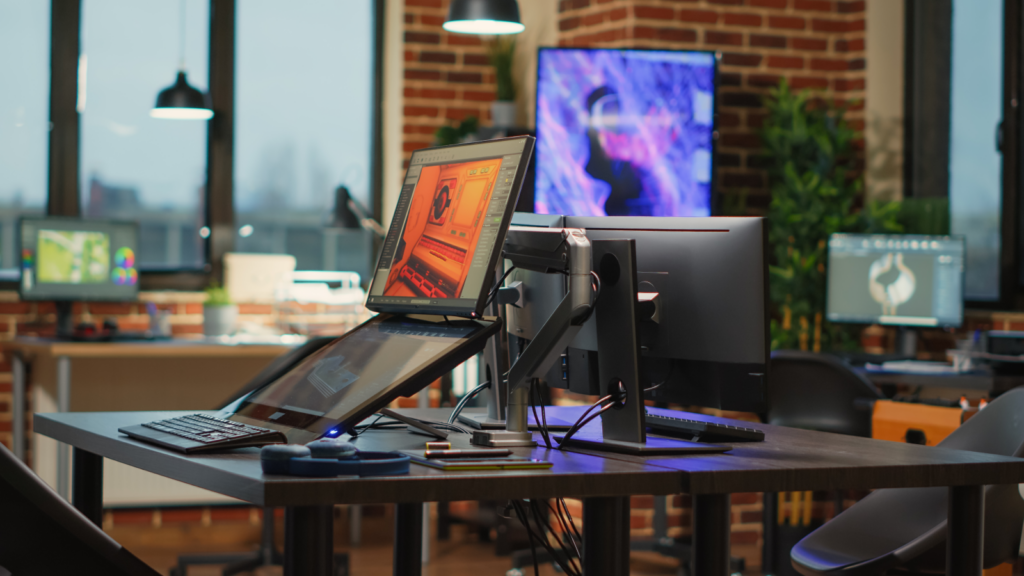 A desk featuring a computer and a monitor showcasing a modern workspace setup.