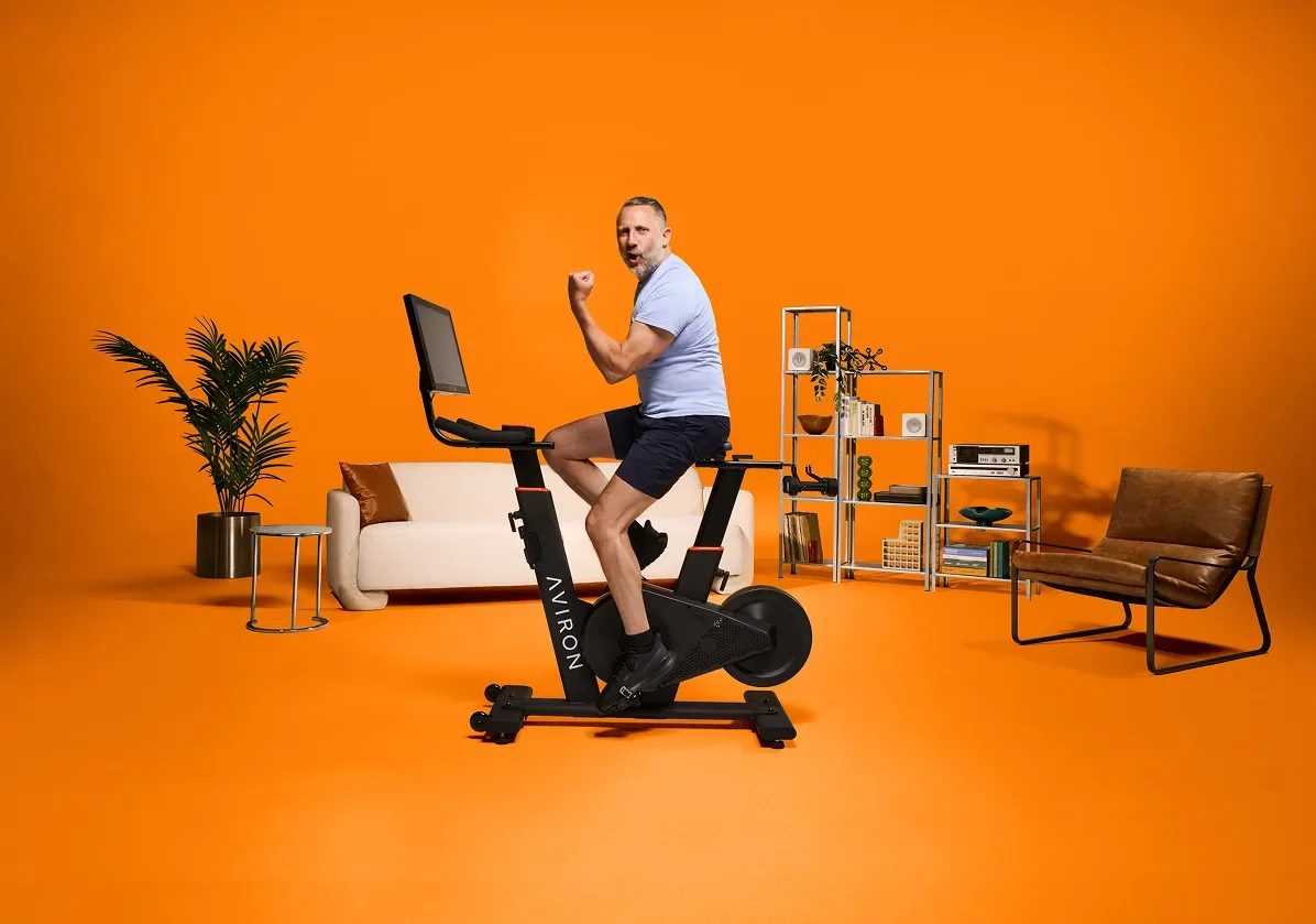 Man building leg strength on an indoor stationary bike