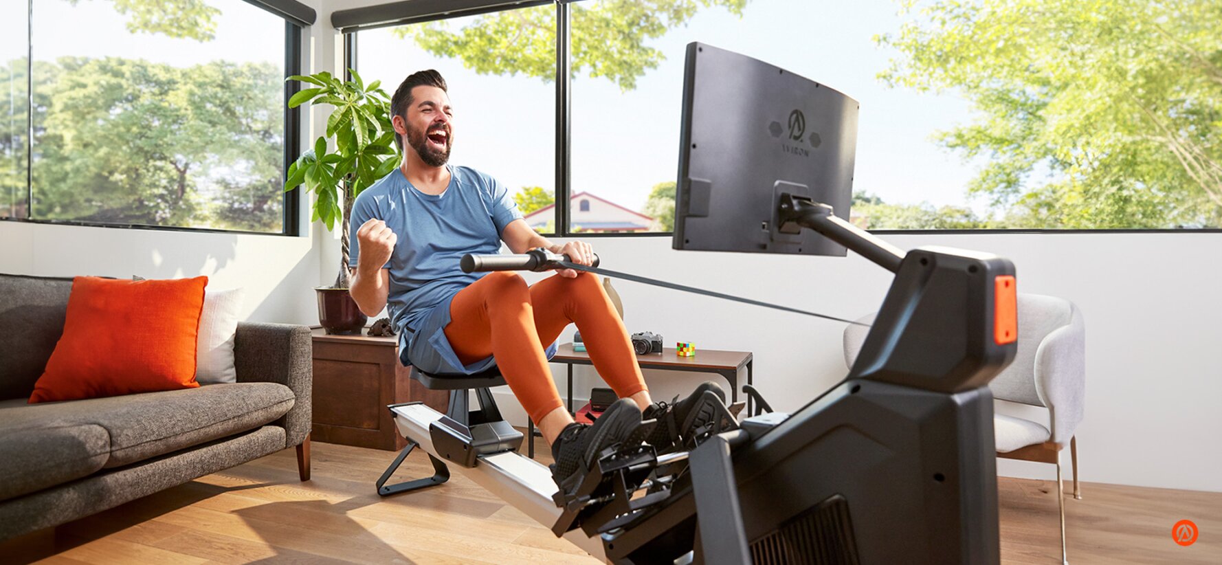 Man on rowing machine burning calories