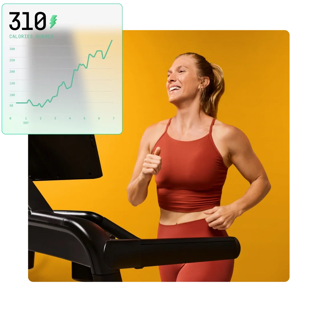 Smiling woman on the Aviron Victory treadmill with a calories-burned progress chart