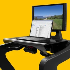 Aviron WalkDesk with a laptop on top, mounted on an Aviron treadmill