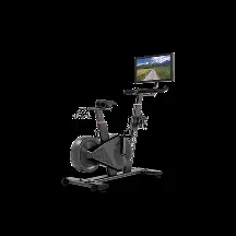 Aviron Fit Bike S showing a scenic coastal ride on screen