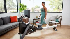 Aviron Strong Series Rower in a home living room