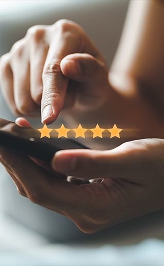 Customer giving business five stars review