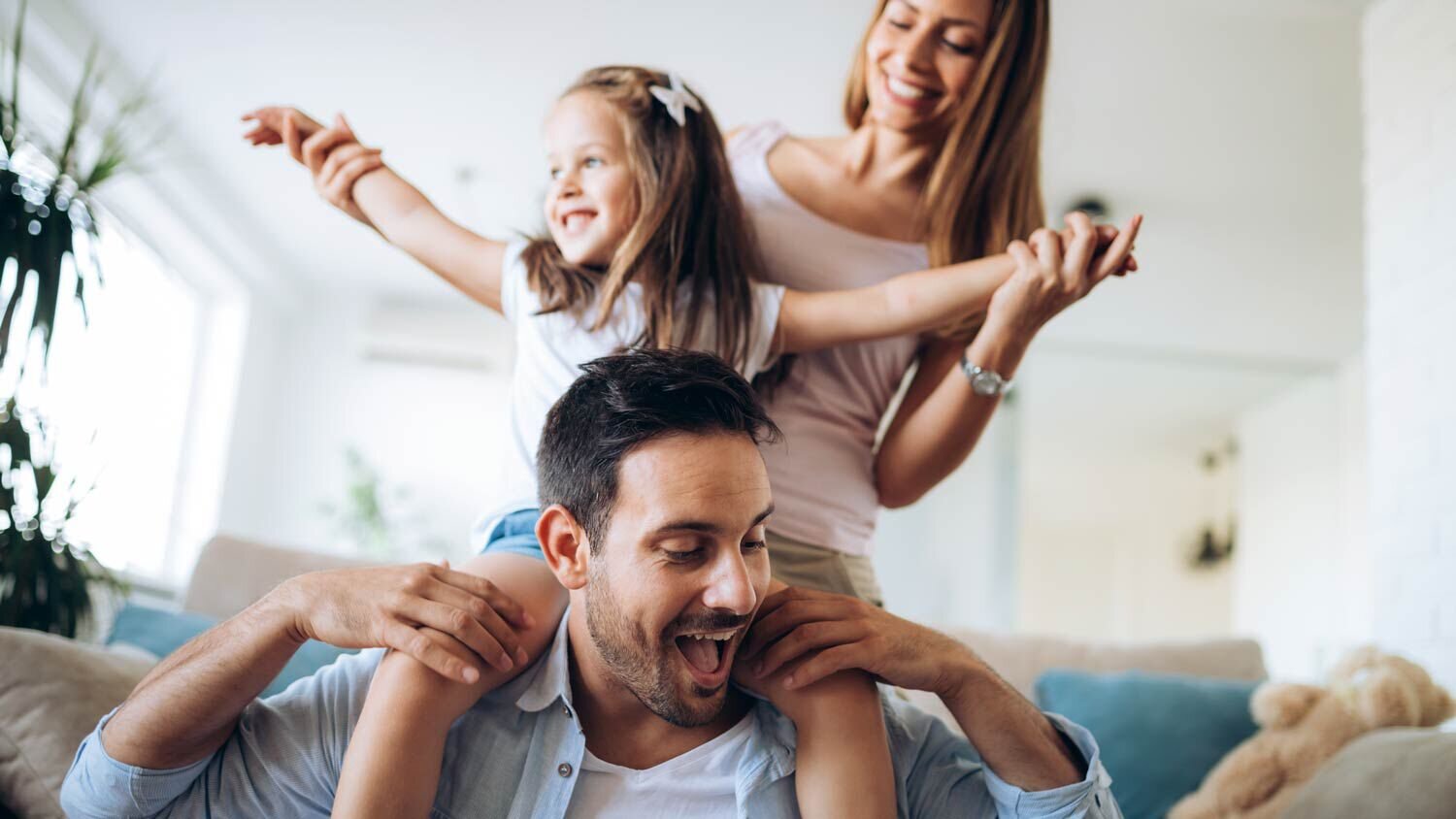 Family playing on the living room