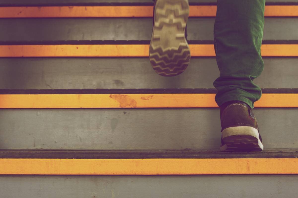 Person climbing stairs
