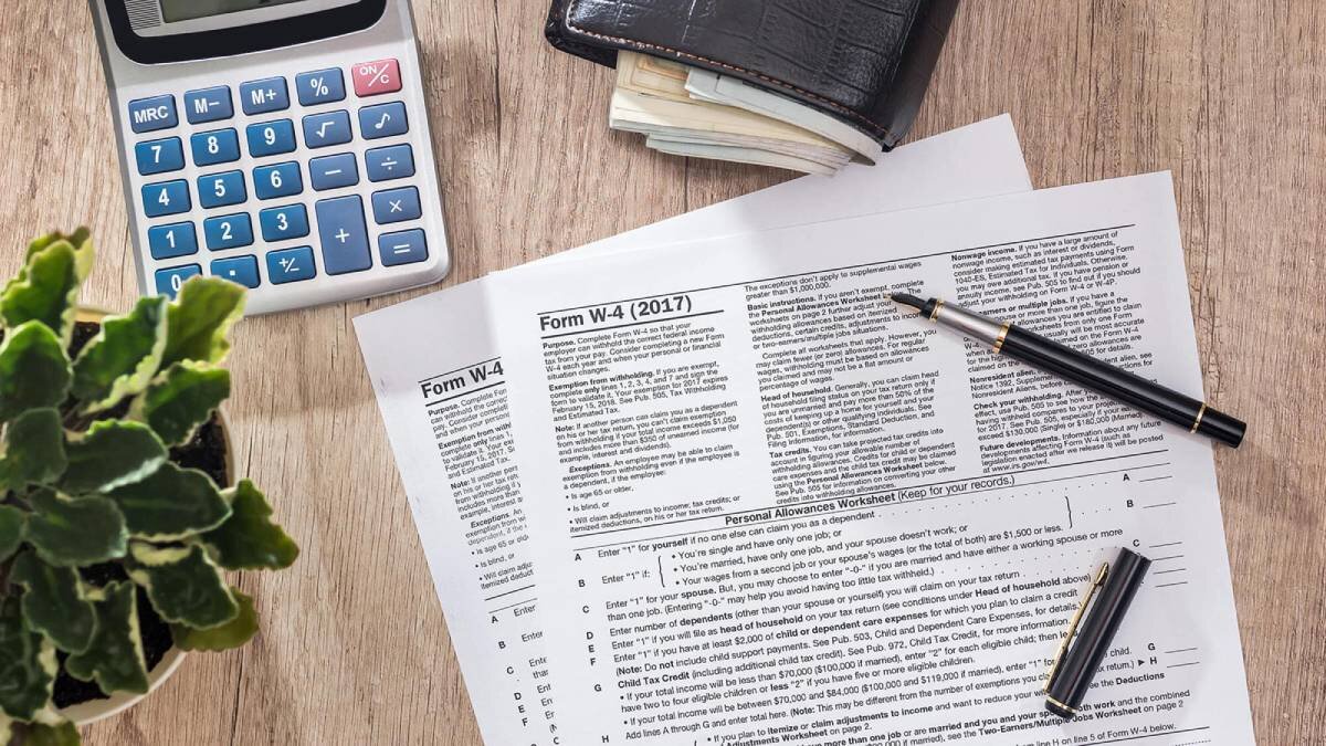 Some w-4 tax forms on desktop