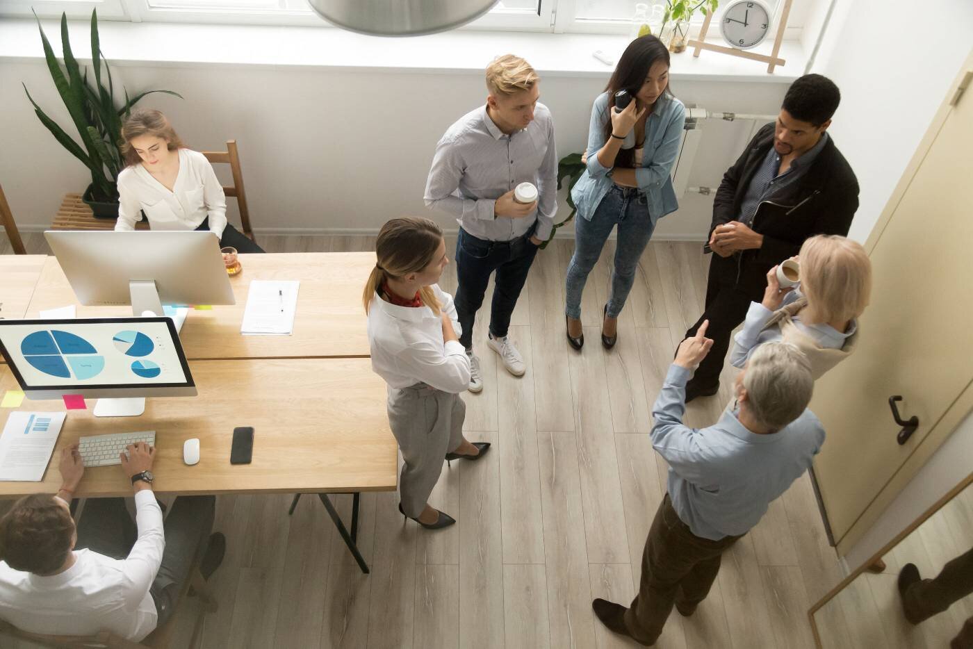 Co-workers meeting in the office