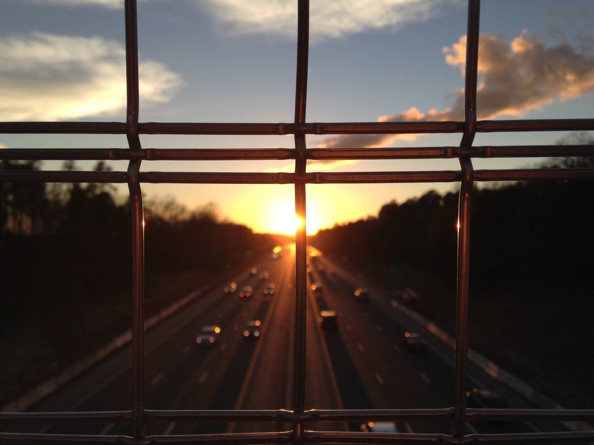 Sunset view on highway from bridge