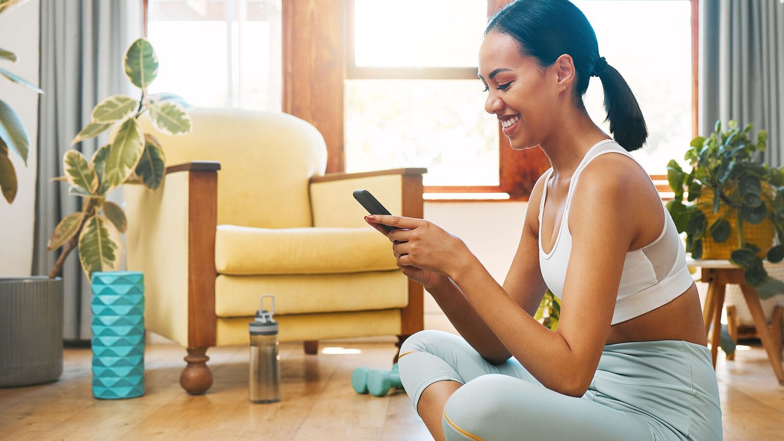 woman typing on her phone