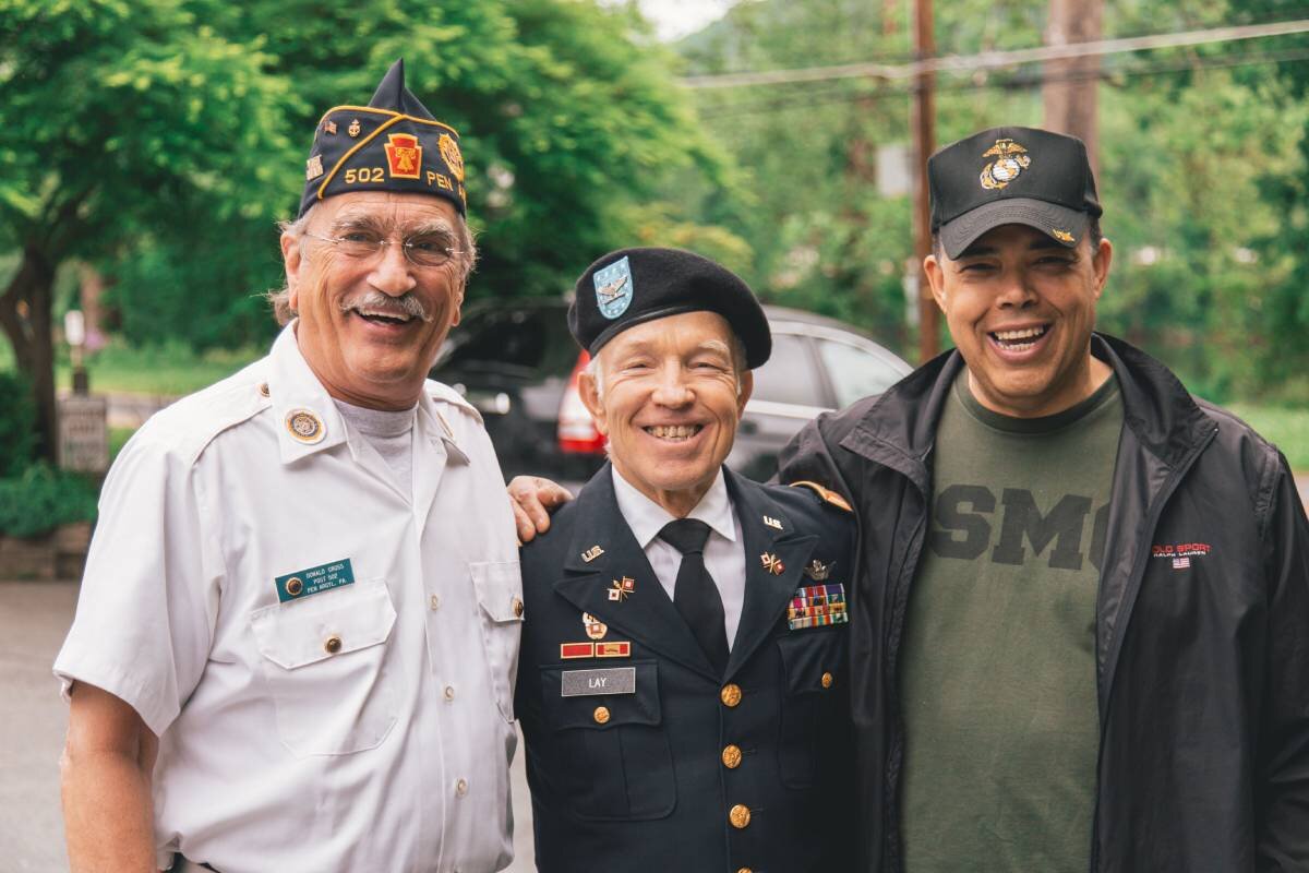 3 veterans smiling