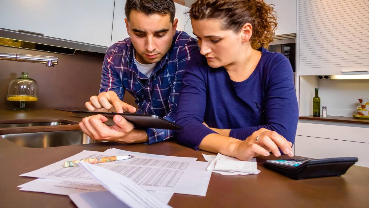 Couple checking health savings