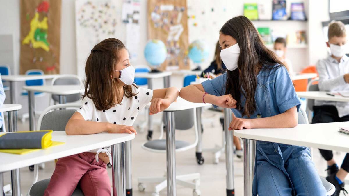 Girls at school during the pandemic