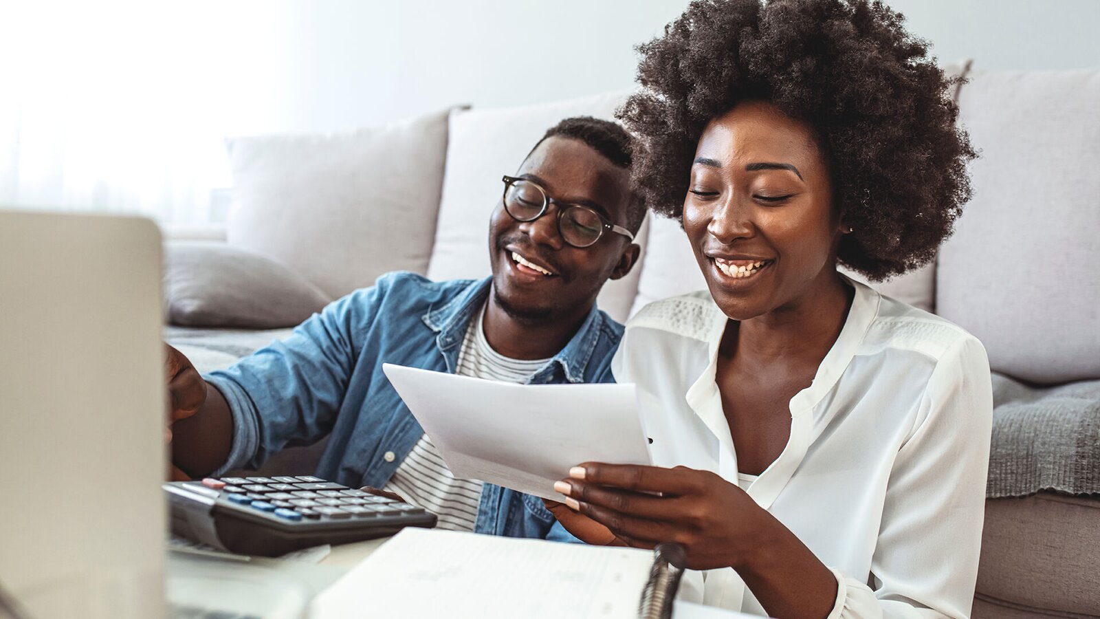 man and woman going over files