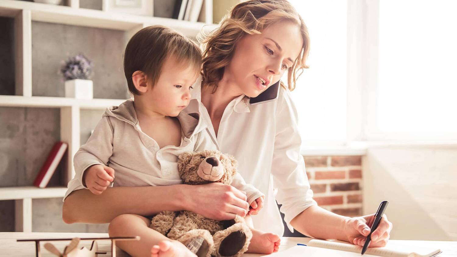 mom holding child