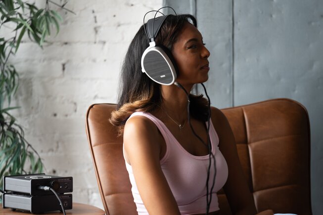 woman wearing the dan clark audio AEON CORE Headphones