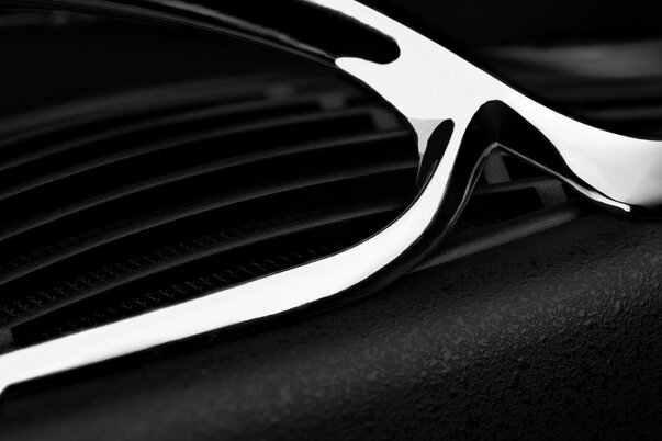 Meze Audio ARTA Headphones close up of silver metal accents on ear cup grille
