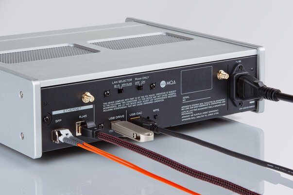 TEAC NT-507T Network Transport back panel view with cables and USB drive plugged into ports