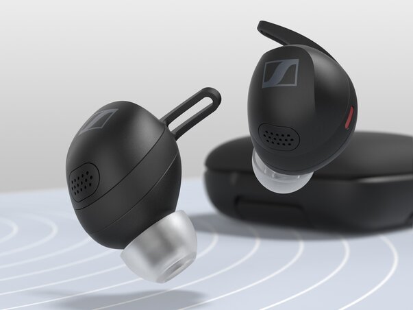 Momentum Sport True Wireless floating above blue track with case in background