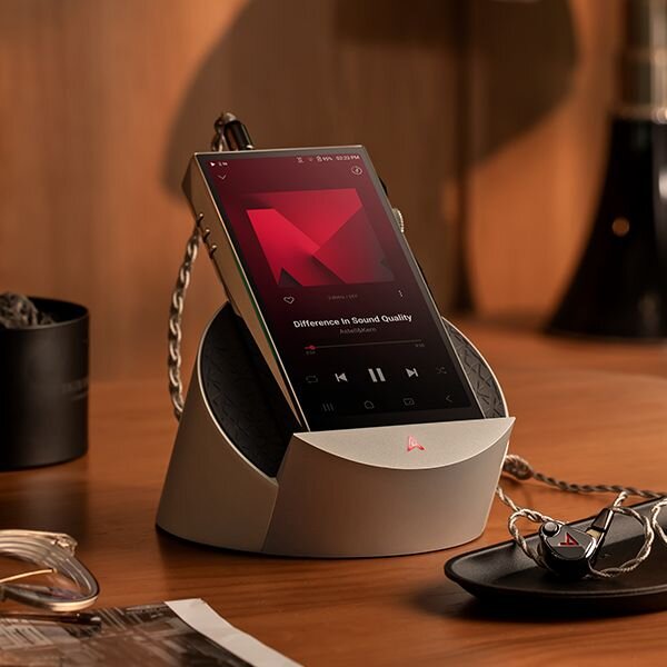 PD10 on the docking cradle on a wooden table attached to iems