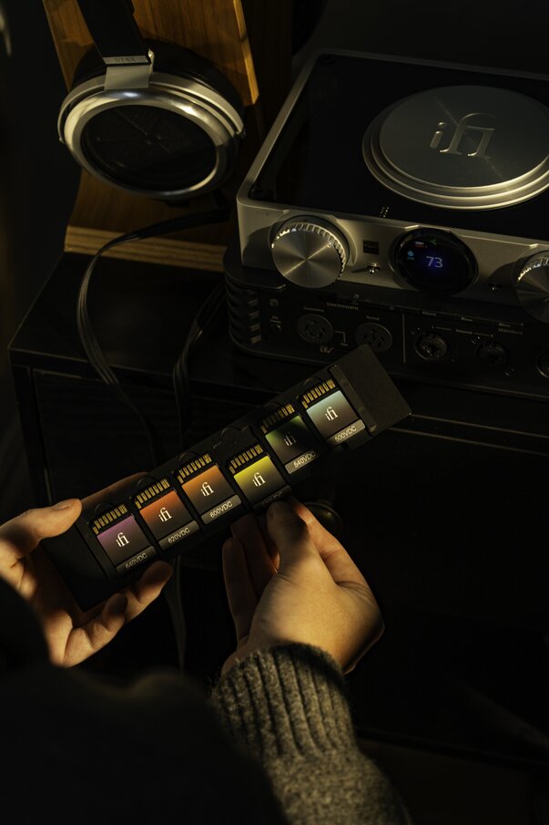 iFi Audio iCan Phantom with person holding the bias memory cards