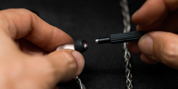 64 Audio Ocean IEMs in someone's hand