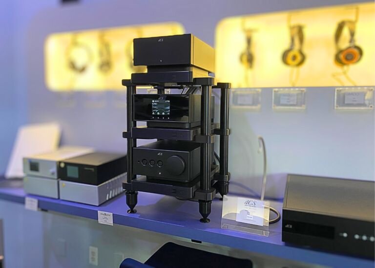 exrh stand with units on table in between amps 