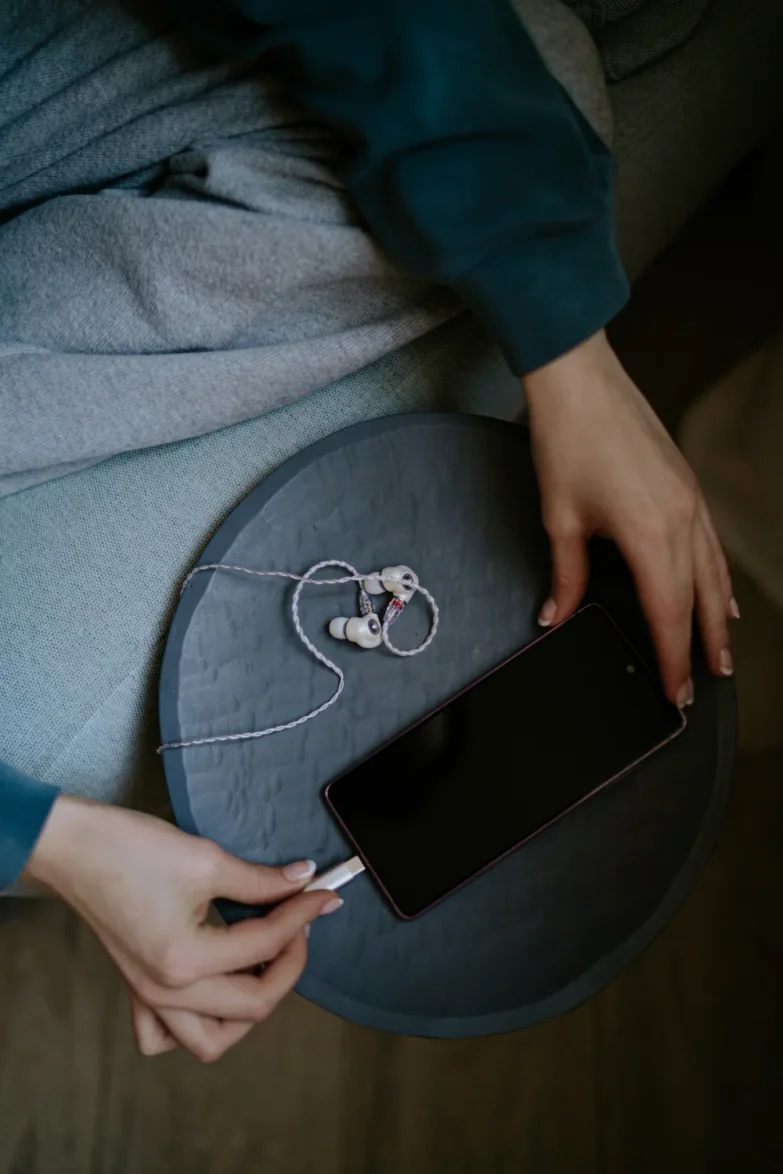 ALBA's on the table plugged into the phone