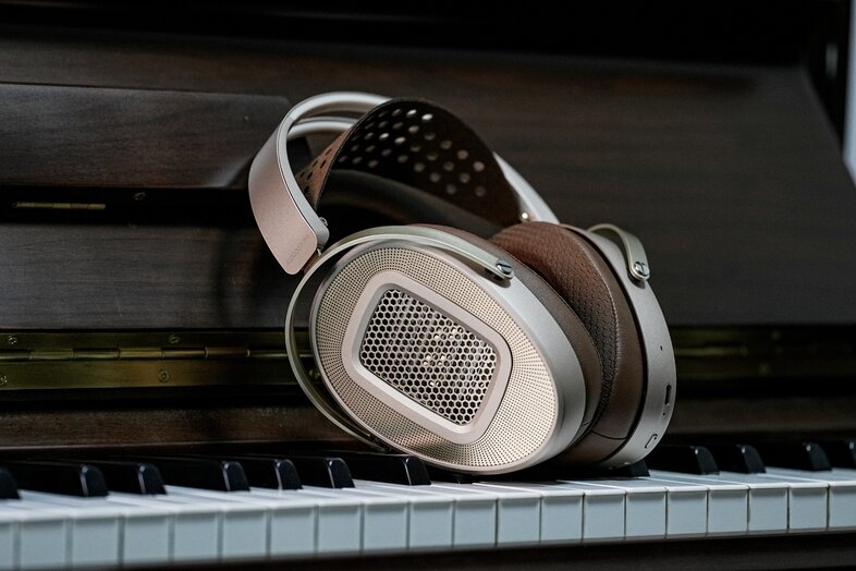 HES1000 Wifi headphones on piano