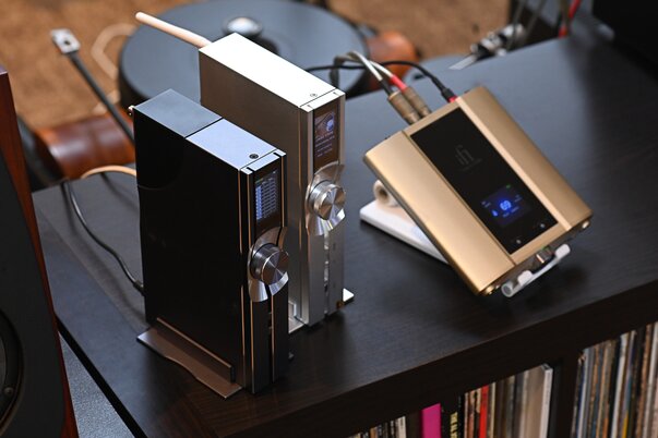 ifi audio gear on a table connected with cables