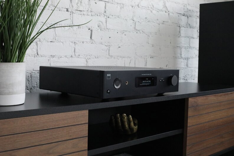 C 3030S Stereophonic Amplifier on entertainment center close up