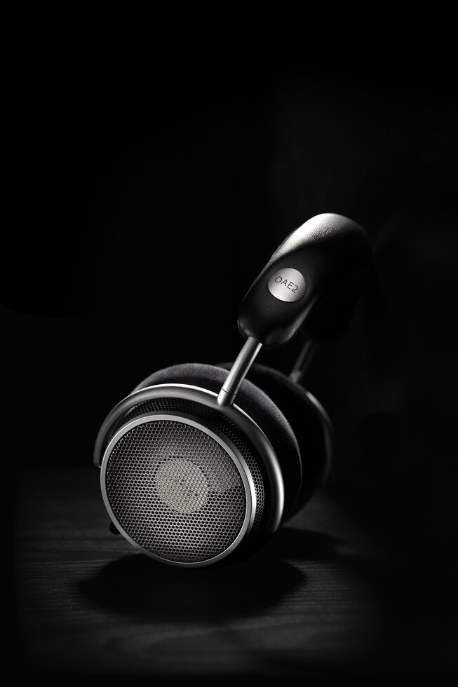OAE2 titled backside view with black background and surface