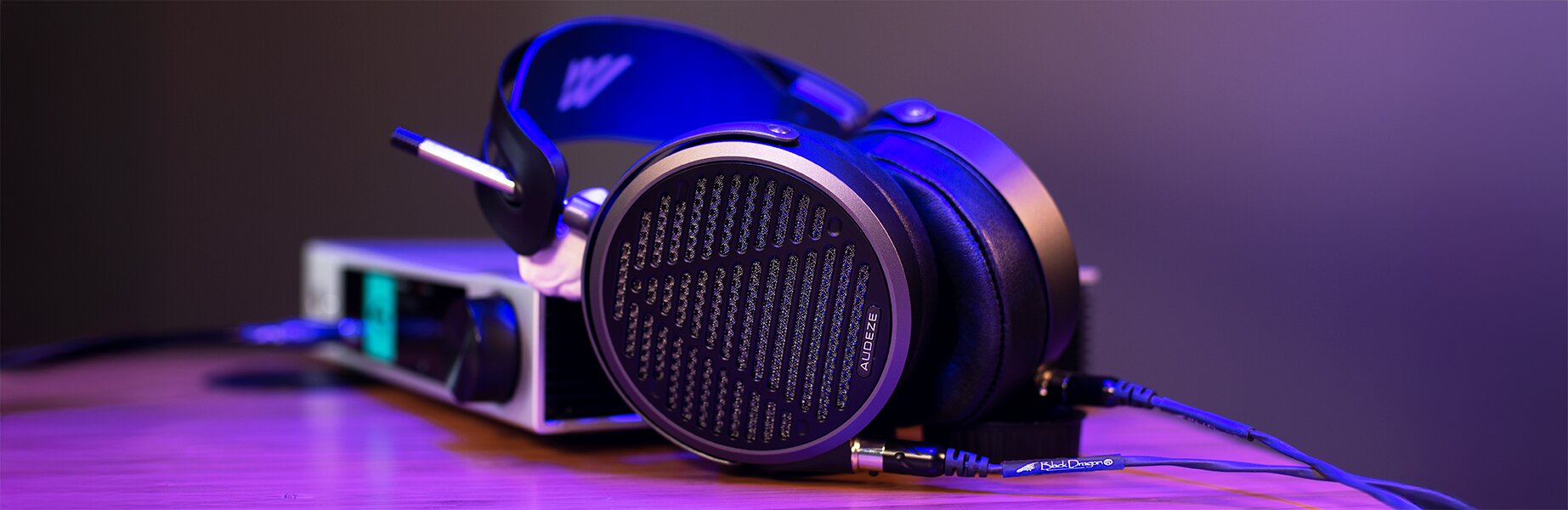 Audeze MM-500 Headphones with music streamer in background