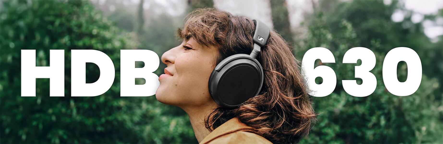 woman wearing the sennheiser HDB 630 Wireless Headphones outside