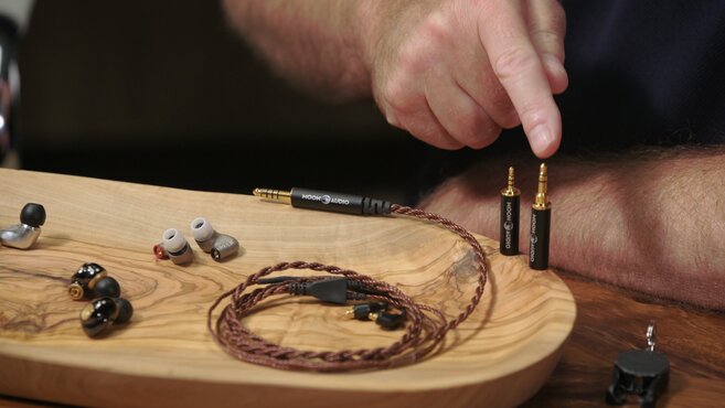 employee making a moon audio dragon audio cable