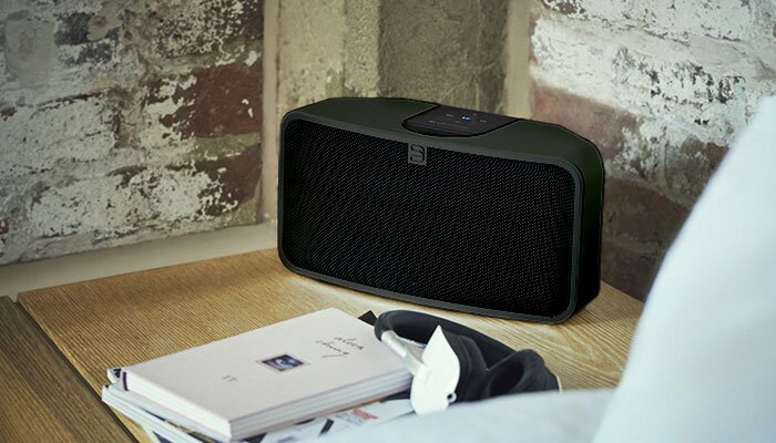 Pulse Mini 2i on wooden nighstand