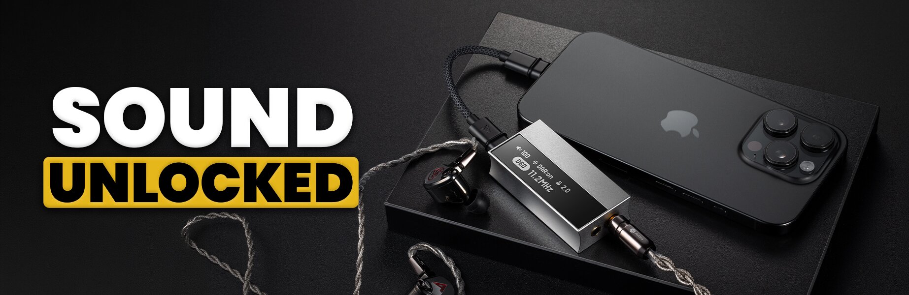 DAP, iphone cord, adapter cables, headphones, and IEMs scattered on a table