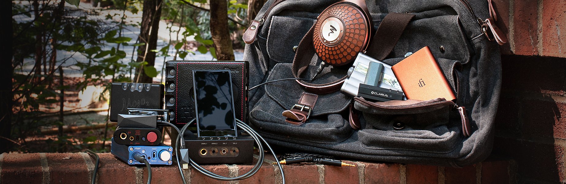 Portable DACs on a messenger bag outside