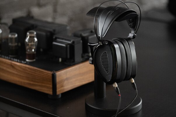 Dan Clark Audio NOIRE XO Open-Back Headphones next to amplifier